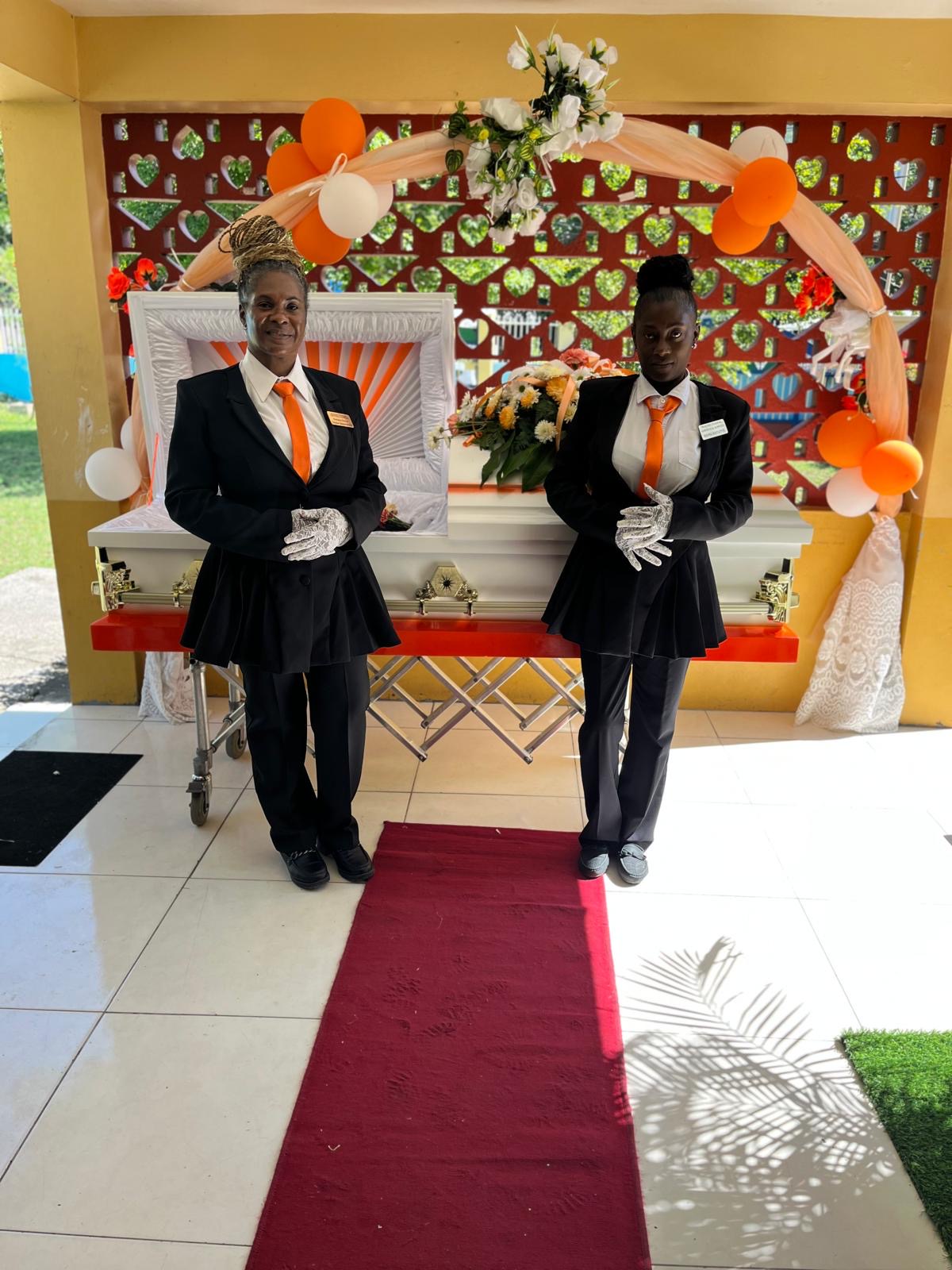 White Casket with Orange Accents