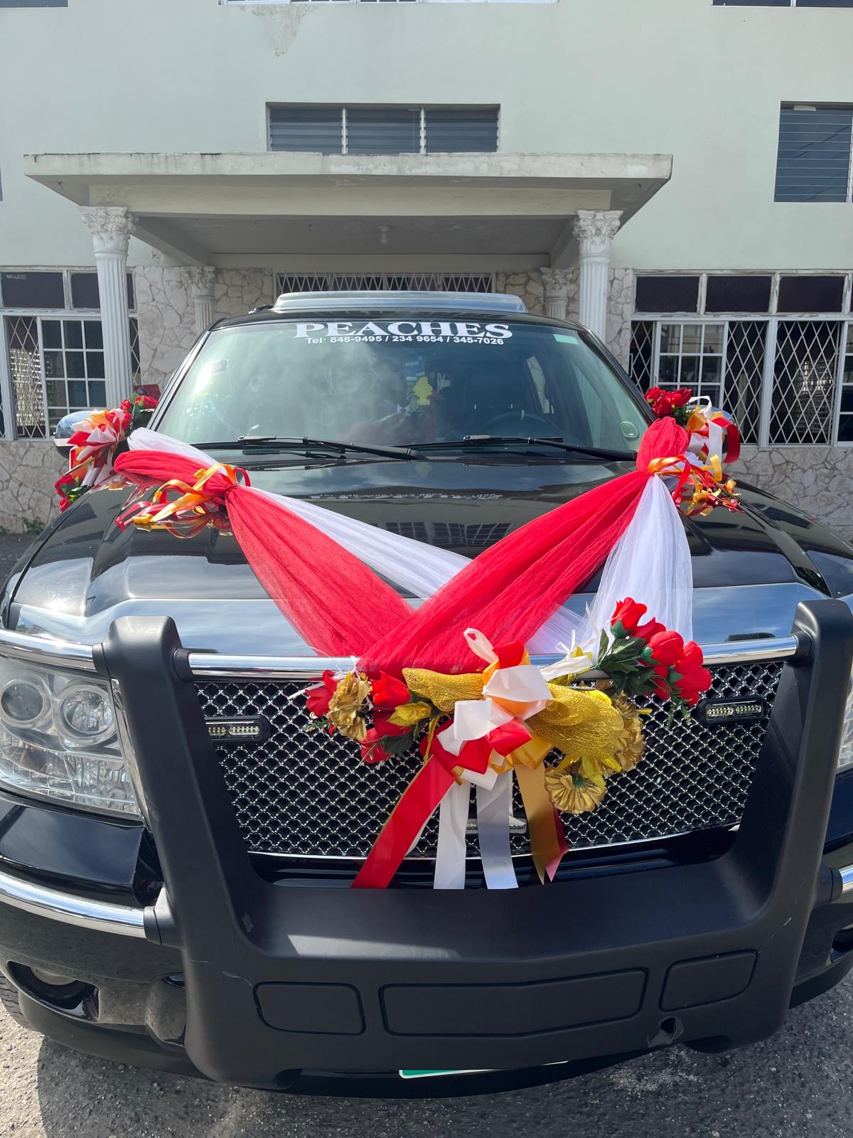 Black SUV with Red Drapes