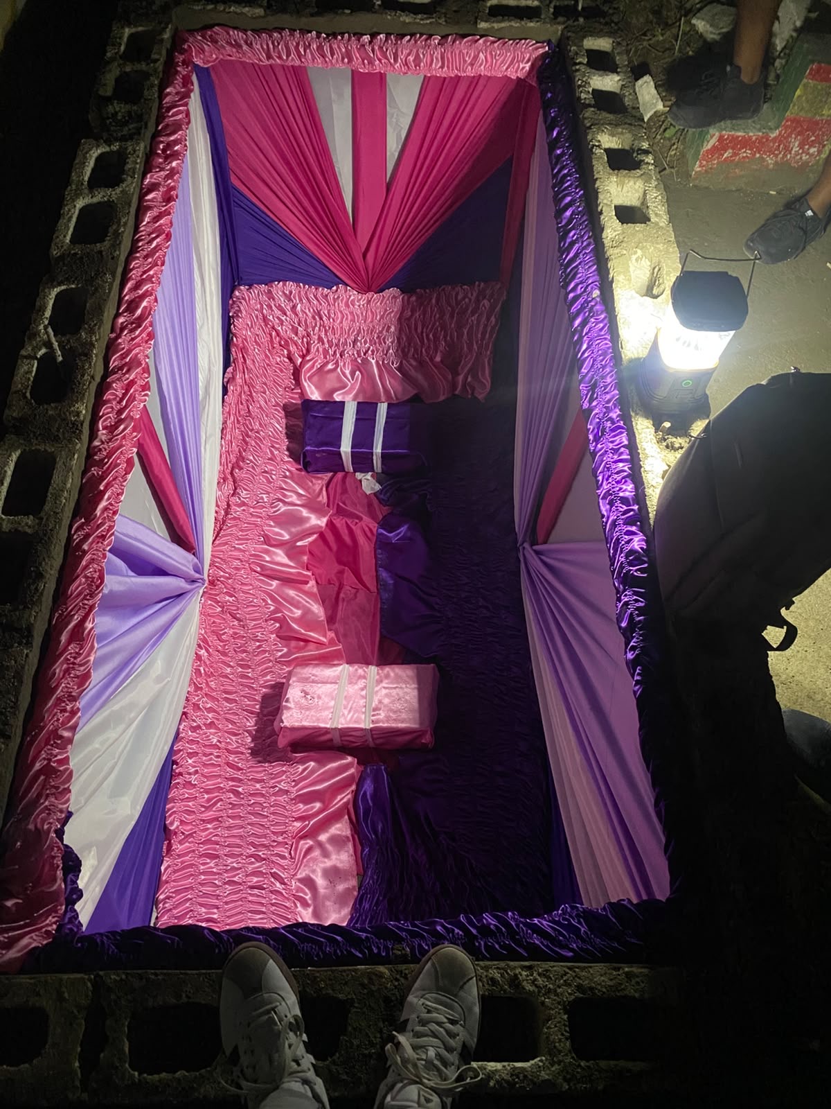 A pink and purple lined vault