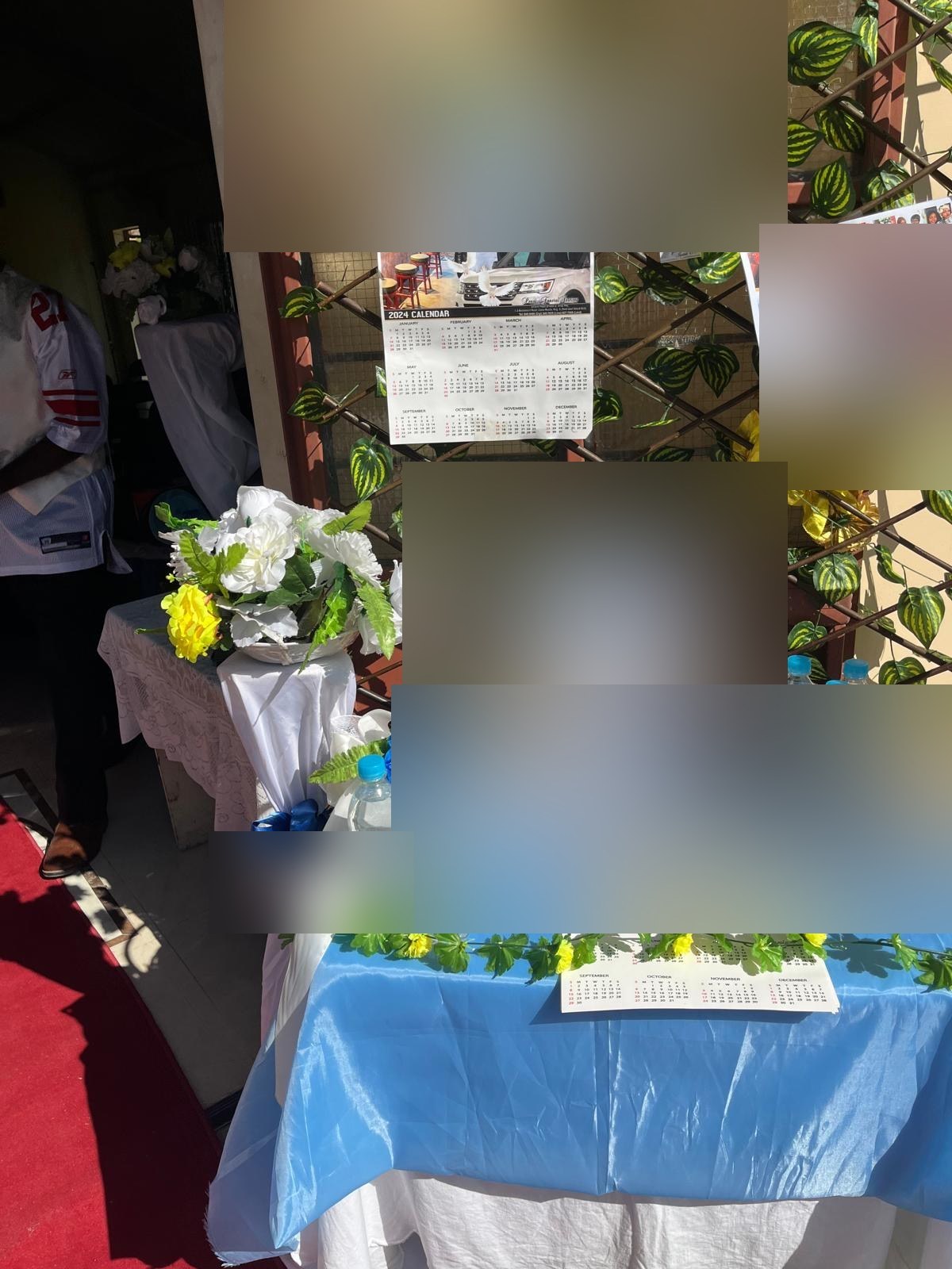 A blue and yellow welcome table