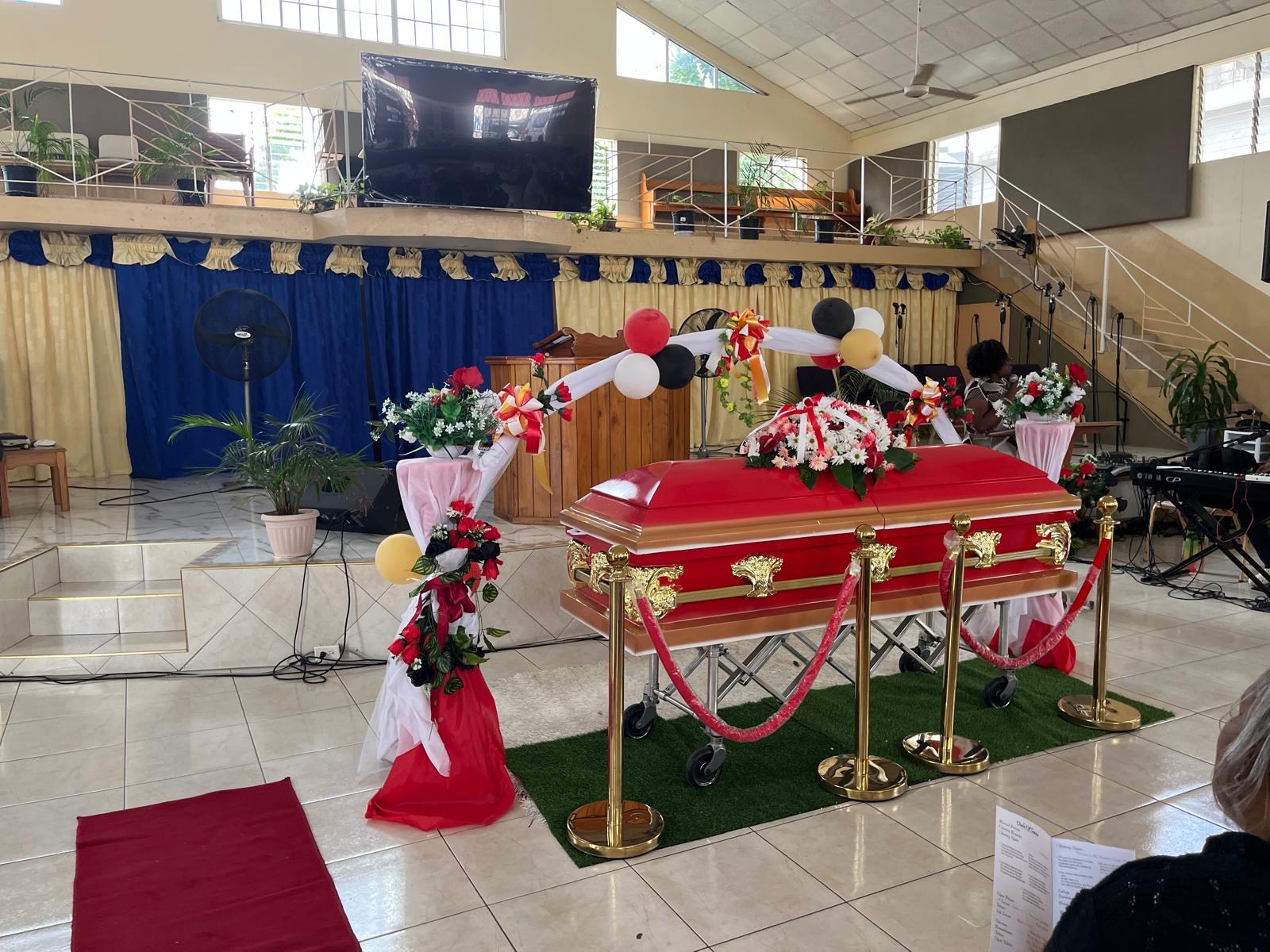 Red Casket with Gold Trim