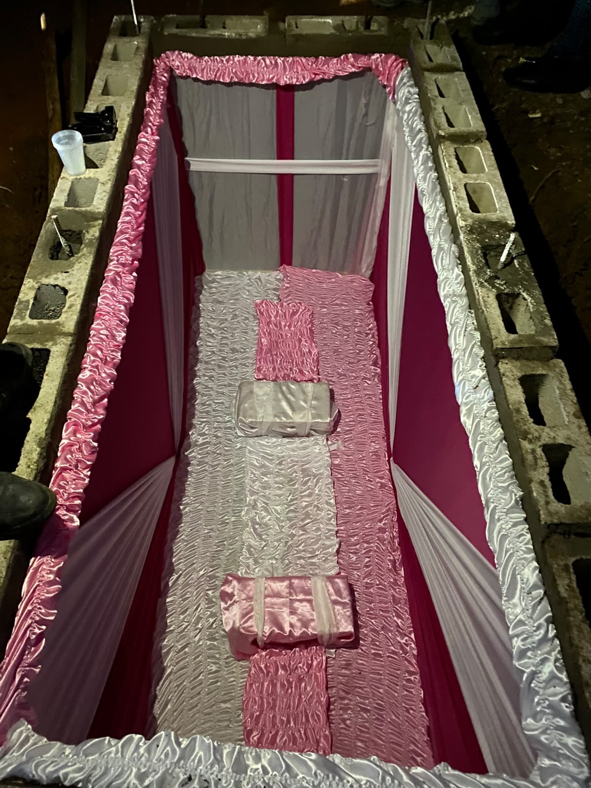 A pink and white lined vault