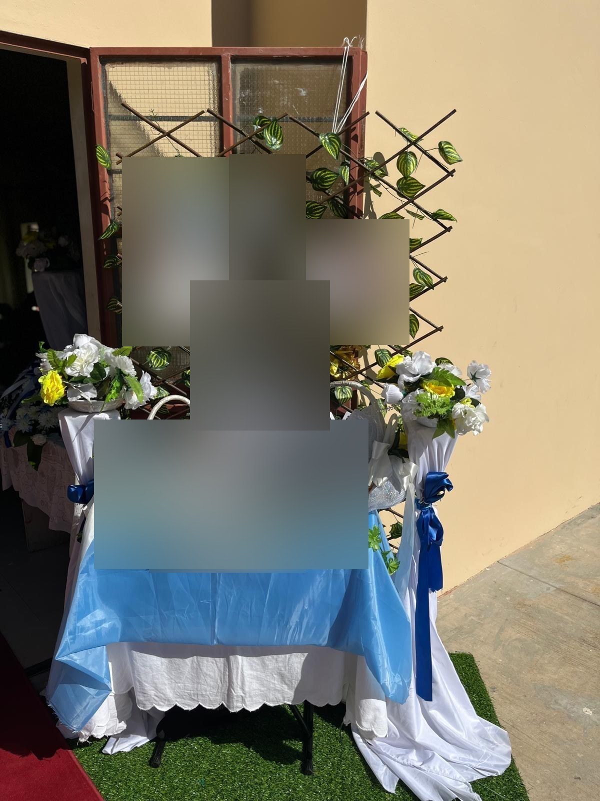 A blue and white welcome table
